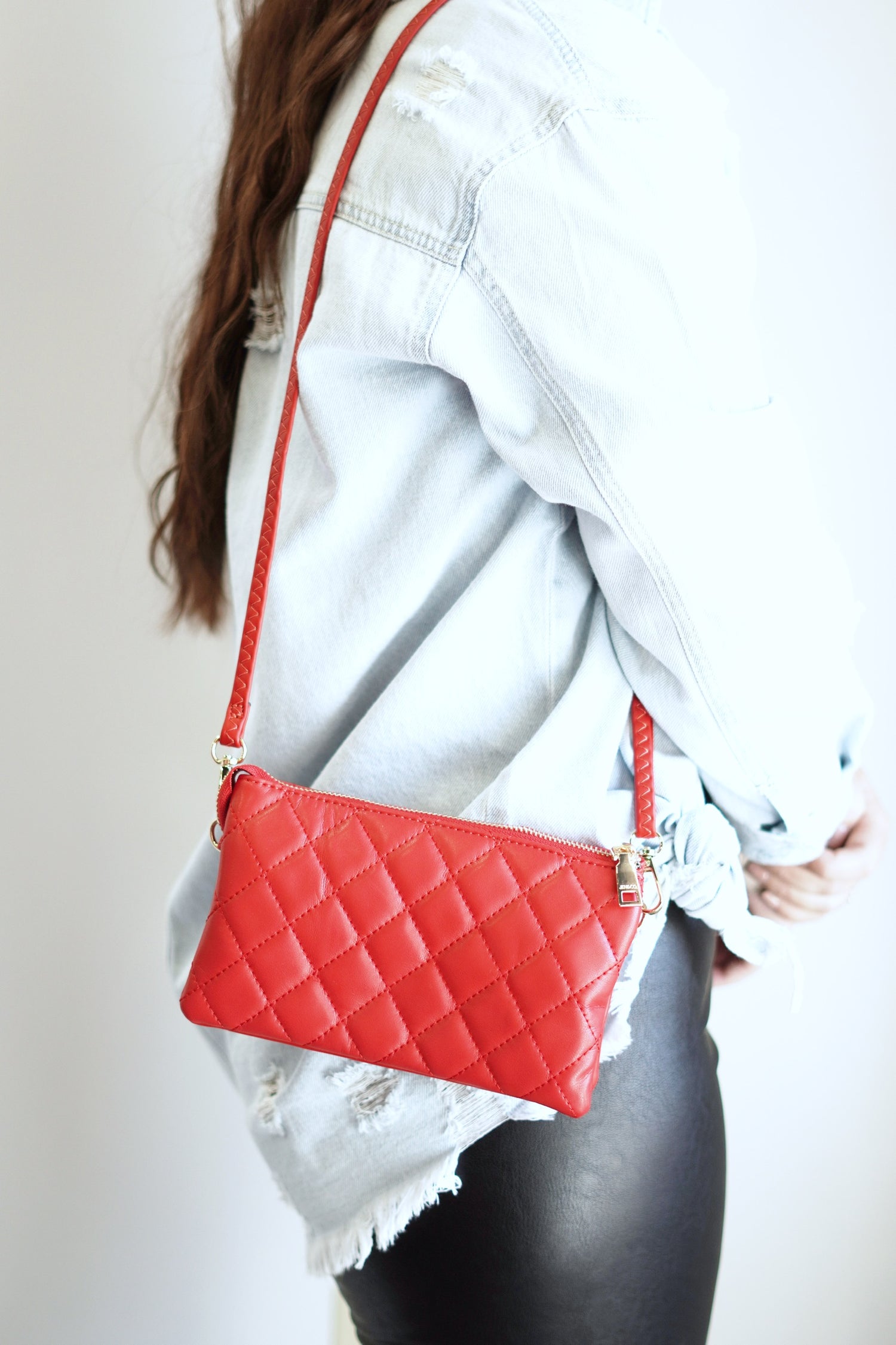 Riley Quilted Crossbody Wallet 5 Compartments 6 Card Slots  1 Interior Zipper  Zipper Closer   Colors: Red One Crossbody Strap, One Wristlet Strap - Both Removable 8.5 x 5.5in