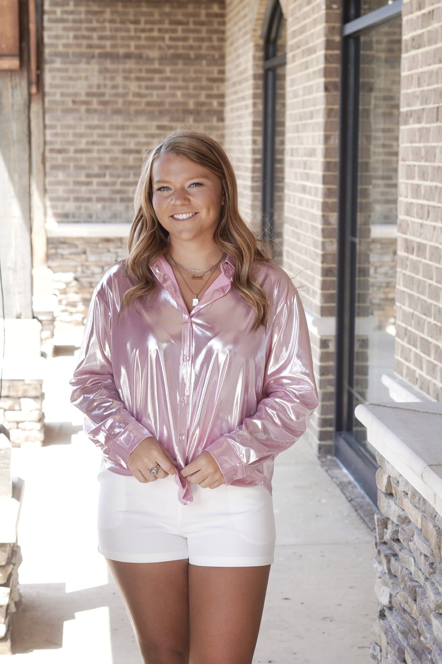 Night Out Metallic Button Up Blouse Collared Neckline Button Down Feature Long Cuffed Sleeves Metallic Stretchy Fabric Full Length Relaxed Fit 96% Polyester, 4% Spandex pink colored