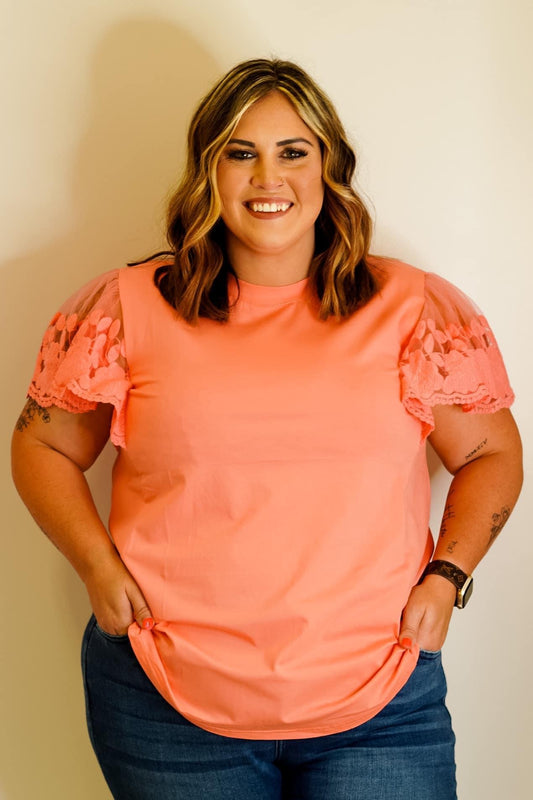Cora Flower Detail Blouse (Lush and Regular) Short Sleeved Flower Detail on Shoulder Available in sizes S-3X 6.8% Spandex