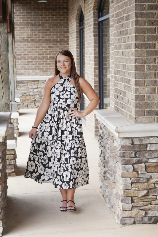Florence Halter Neck Midi Dress Halter Neckline Tie Closure On Back Of Neckline Sleeveless Color: Black Cream Floral Print Detail Open Back Midi Dress Fabric Content: 100% Cotton, 100% Rayon
