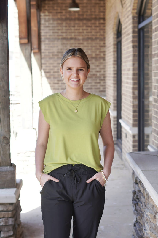 <ul> <li>Lenon Lime Sleeveless Top</li> <li>Round Neckline</li> <li>Sleeveless</li> <li>Color: Lime</li> <li>Loose Fit</li> <li>Full Length</li> <li>66% Rayon, 29% Polyester, 5% Spandex</li> </ul>