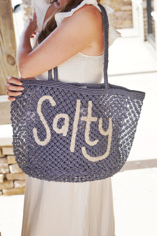 blue crochet tote that says salty in white lettering