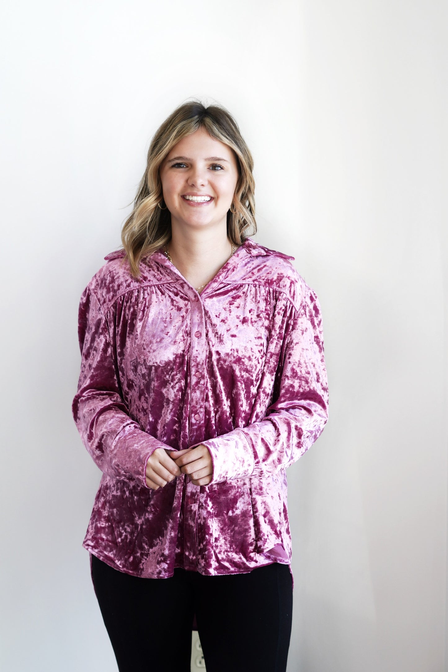 Val Velvet Fuchsia Top Collared Neckline Long Cuffed Sleeves Longer in the Back Button Down Detail Velvet Material Color: Fuchsia Relaxed Fit Full Length 95% Polyester, 5% Spandex