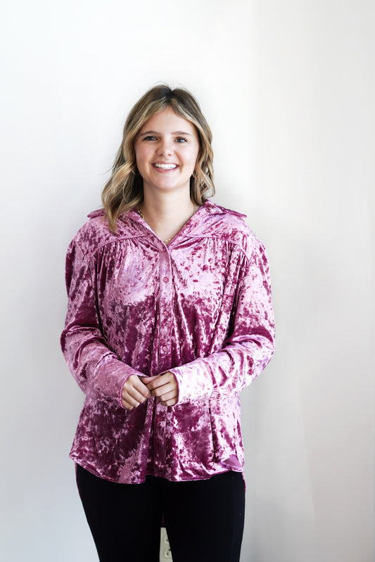 Val Velvet Fuchsia Top Collared Neckline Long Cuffed Sleeves Longer in the Back Button Down Detail Velvet Material Color: Fuchsia Relaxed Fit Full Length 95% Polyester, 5% Spandex
