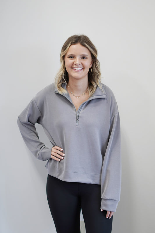 Saylor Scuba Half Zip Pullover Half Zip, Collar Neckline Long Sleeve Side Slits Color/ Grey Relaxed Fit Below Waistline Length 48% Polyester, 48% Viscose, 4% Spandex