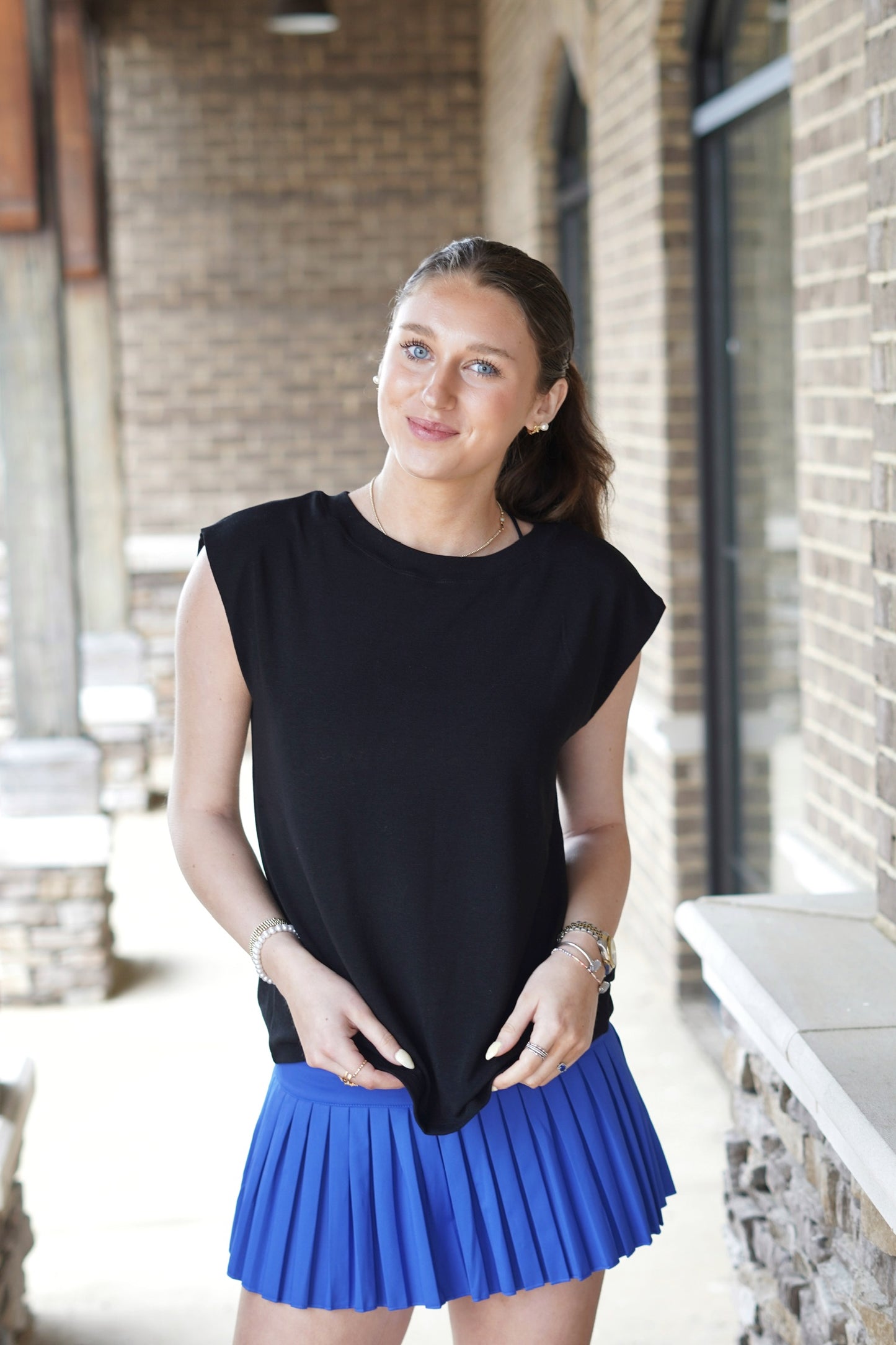 <ul> <li>Lenon Lime Sleeveless Top</li> <li>Round Neckline</li> <li>Sleeveless</li> <li>Colors: Black</li> <li>Loose Fit</li> <li>Full Length</li> <li>66% Rayon, 29% Polyester, 5% Spandex</li> </ul>