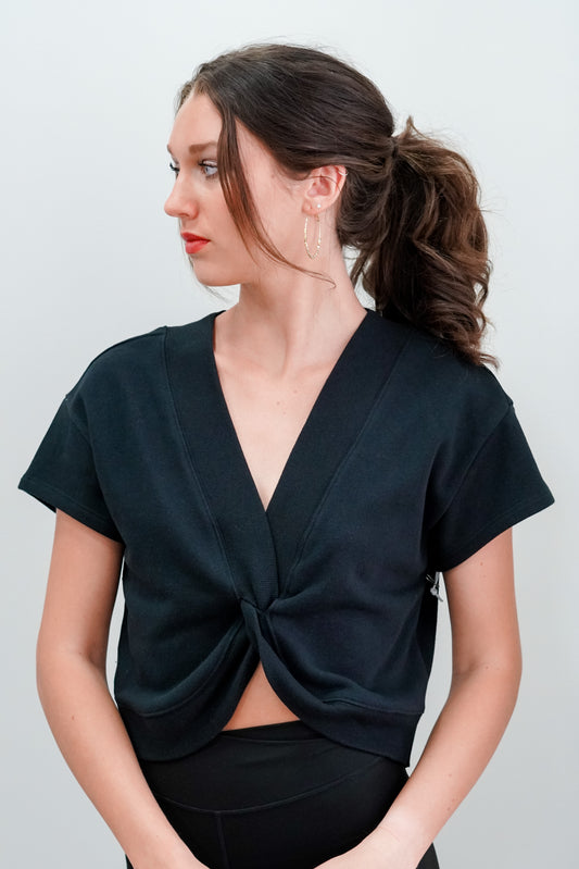 This Kelly Knot Active Top is the perfect top you need this summer! Throw it on over your gym fit, or dress it up! Kelly Knot Active Top V-Neckline Short Sleeves Black Color Cropped Length