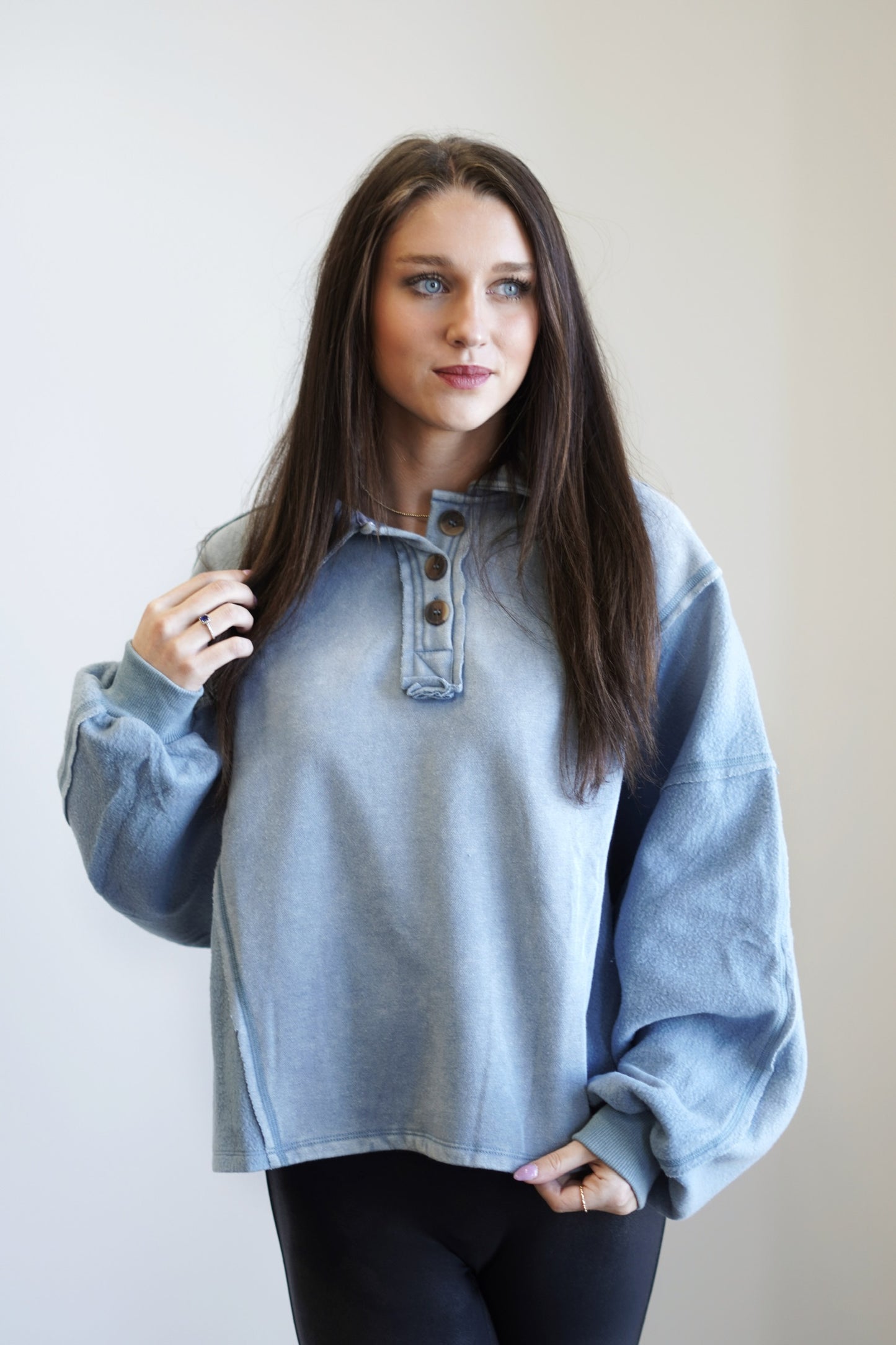 Ready for the Day Raw Hem Pullover Henley Collared Neckline Long Cuffed Sleeves Raw Hem Detail Colors:  Dusty Blue Full Length Relaxed Fit 60% Polyester,40%. Cotton