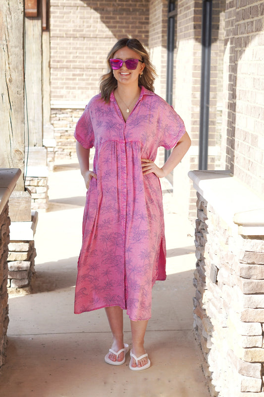 <ul> <li>Malibu Must Have Button Down Maxi Dress</li> <li>V-Neckline w/ Collar</li> <li>Short Sleeves</li> <li>Button Down Style</li> <li>Pockets</li> <li>Color: Malibu pink </li> <li>Navy Tiger and Palm Tree Print</li> <li>Relaxed Fit</li> <li>Maxi Length</li> <li>70% Rayon, 30% Nylon</li> </ul>