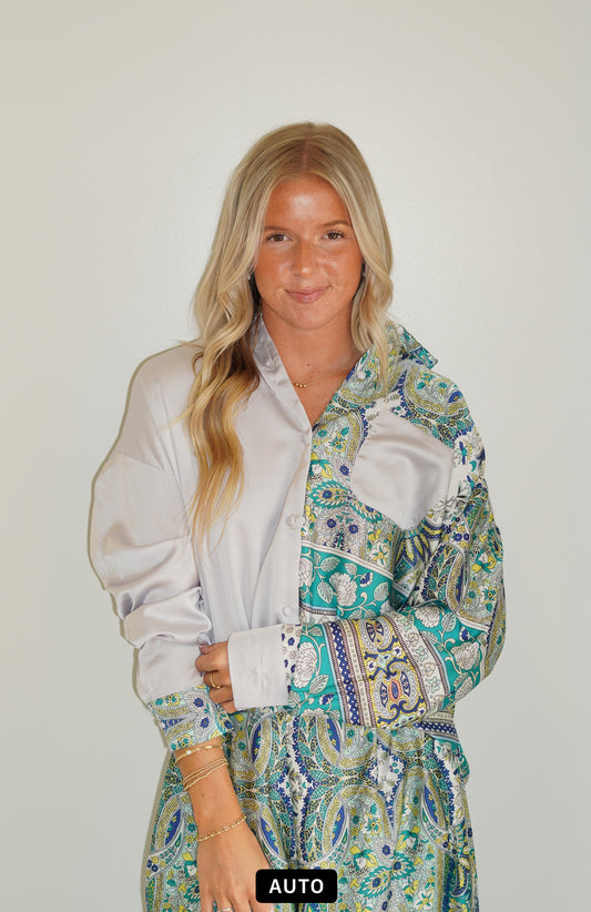 Polly Satin Print Button Up Collar Neck Button on sleeve cuff Silky Button up Half solid, half printed color detail Loose fit 100% Polyester Hang or line dry Model is wearing size Small