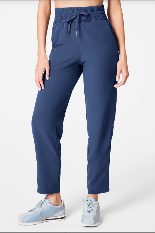 straight slim indigo pants with an elastic waistband and drawstring .