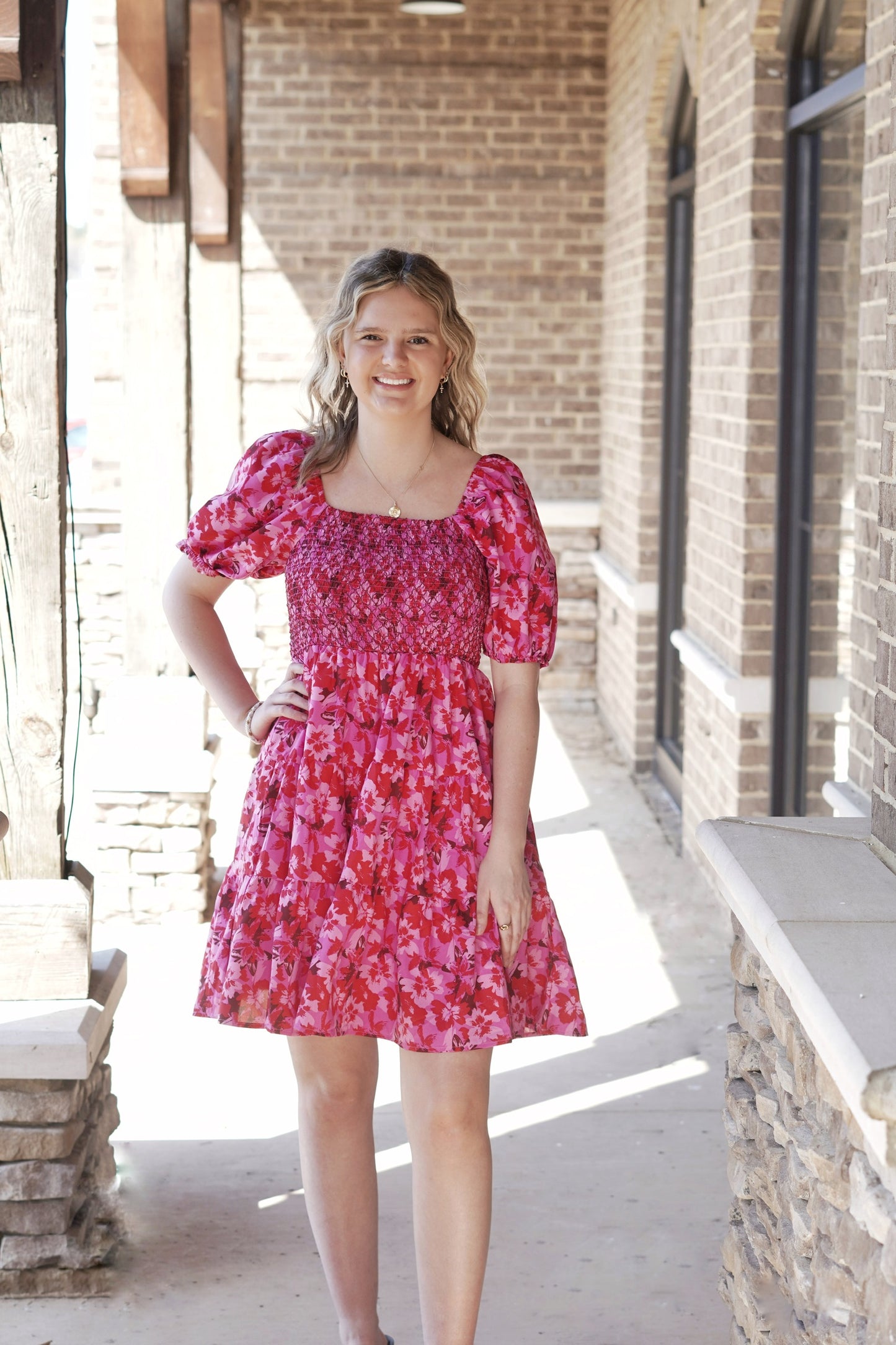 <ul> <li>Farrah Floral Print Puff Sleeve Dress</li> <li>Square Neckline</li> <li>Puff Short Sleeves</li> <li>Floral Print</li> <li>Color: Mixed Hot Pink</li> <li>Mid Thigh Length</li> <li>Side Pockets</li> <li>100% Polyester</li> </ul>