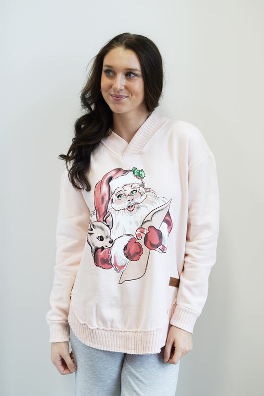 Dear Santa Ice Pink Pullover Double Knit V-Neckline Long Cuffed Sleeves Color: Ice Pink Santa and His Reindeer Pictured Relaxed Fit Mid-Thigh Length 58% Polyester, 42% Cotton