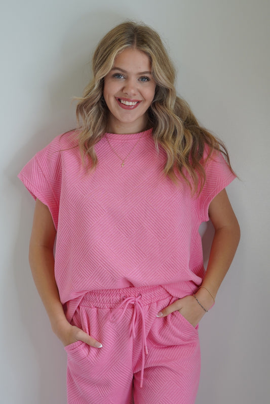 You and your bestie signed up for an outdoor yoga class, now that the heat has died down, but you have no idea what to wear. Don’t worry girlfriend, simply throw on ,Lauren Textured Top and get your downward dog on. Lauren Textured Top Sweatshirt Top Bubble Gum Pink 83% Polyester 15% Rayon 2% Spandex Hand Wash Cold, Do Not Bleach, Hot Iron Low, Tumble Dry Low