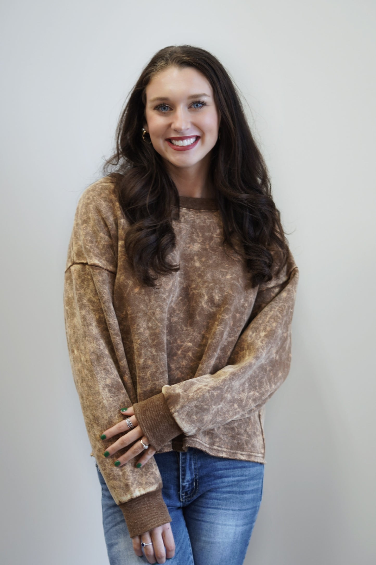 Addison Acid Wash Crew Neck Crew Neckline Long Cuffed Sleeves Acid Washed Fabric Raw Hem Detail Colors: Mocha Full Length Relaxed Fit 50% Cotton, 50% Polyester