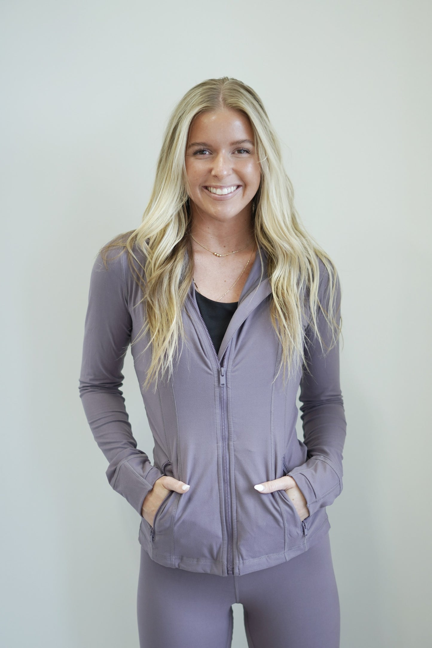 Fast Track Fitted Athletic Jacket Zip Up Closure Zip Up Pockets Long Sleeves Colors: Mulberry, Full Length Fitted 84% Poly Microfiber, 16% Spandex