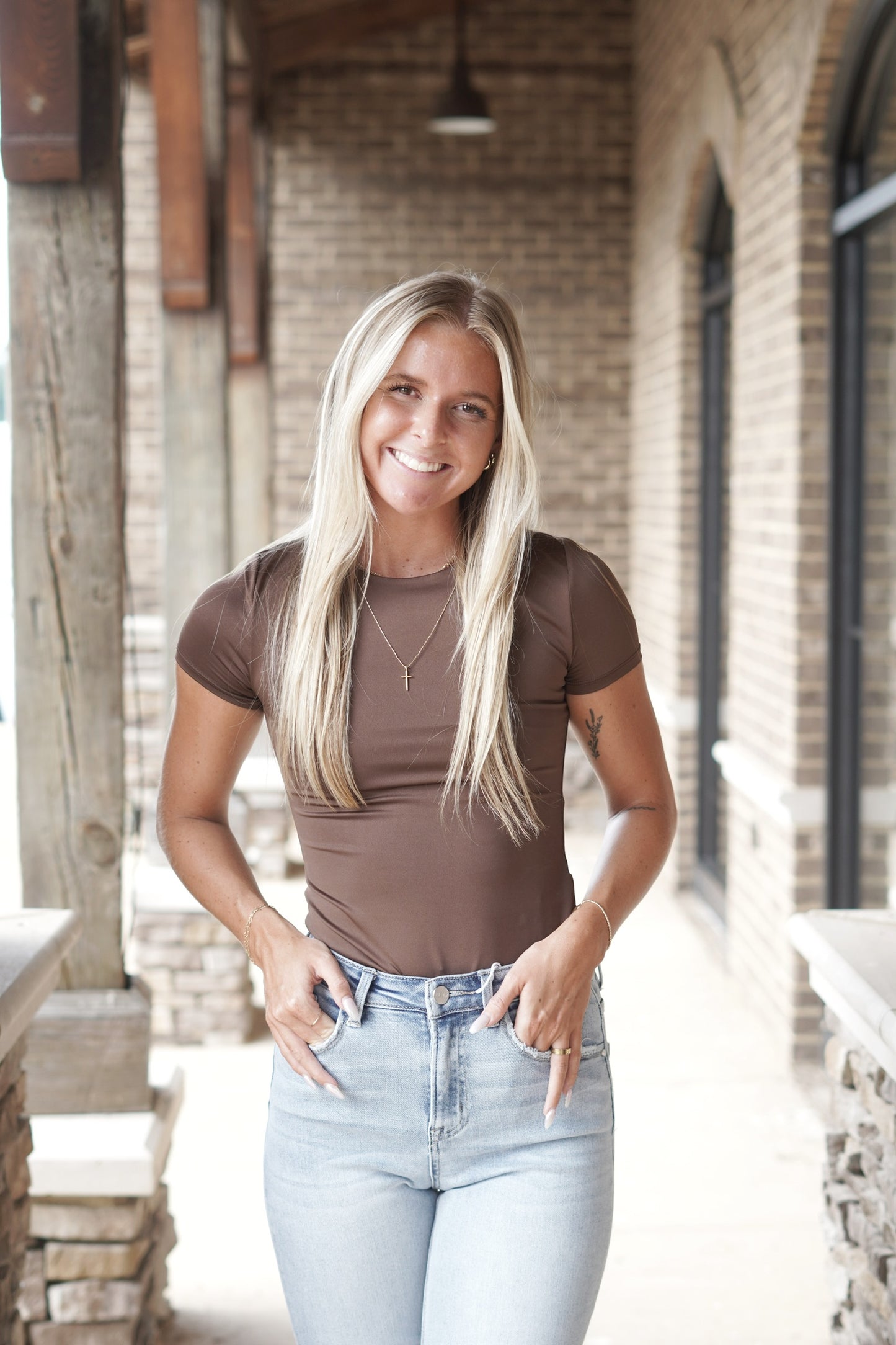 Elise Everyday Short Sleeve Bodysuit Round Neckline Short Sleeve Spandex Material Colors: Coffee Bean, Fitted Bodysuit Fabric Content: 95% Polyester, 5% Spandex