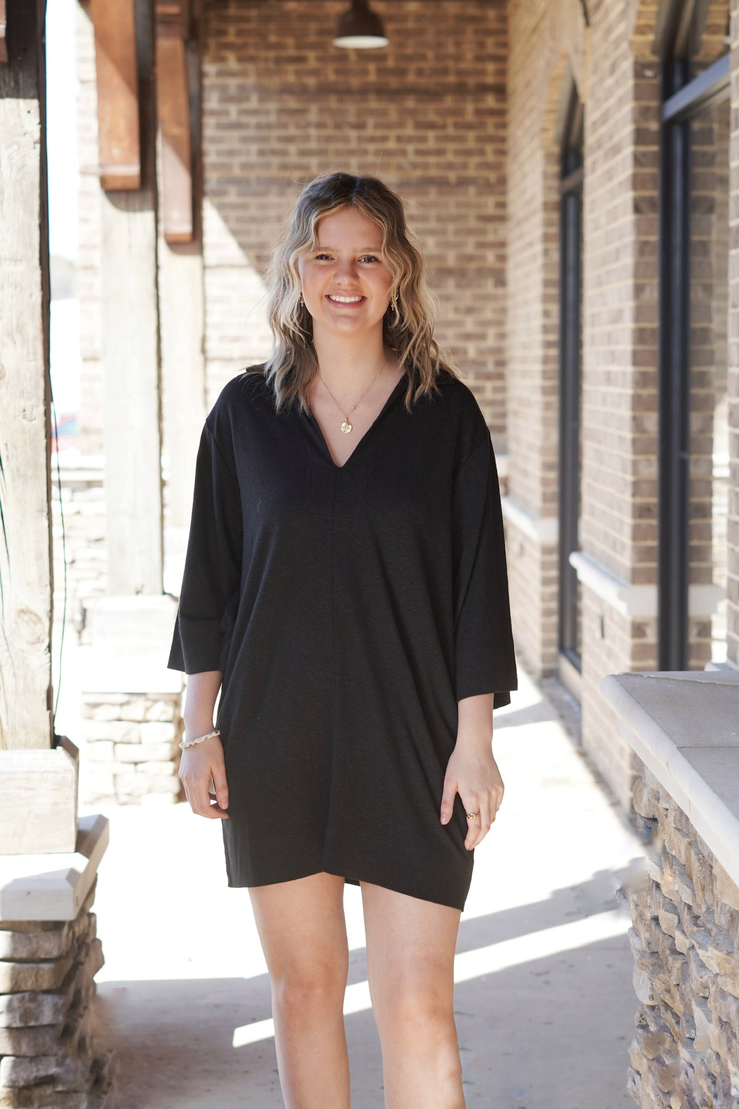 <ul> <li data-mce-fragment="1">Z Supply Mallory Slub Cover Up</li> <li data-mce-fragment="1">V-Neckline</li> <li data-mce-fragment="1">Oversized Relaxed fit</li> <li data-mce-fragment="1">3/4 Length Sleeves</li> <li data-mce-fragment="1">Collared</li> <li data-mce-fragment="1">Color: Black</li> <li data-mce-fragment="1">Henley placket</li> <li data-mce-fragment="1">Mid-Thigh Length</li> <li>Linen Blend Slub: 55% Linen, 45% Rayon</li> </ul>
