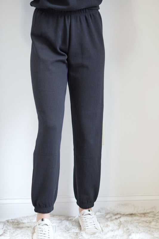 Classic Gym Jogger Easy fit True to size Cvc Fleece: 60% Cotton, 40% Polyester Jogger Pull-on elastic waist Colors: Black, Mid-weight fleece Wash cold, tumble dry low