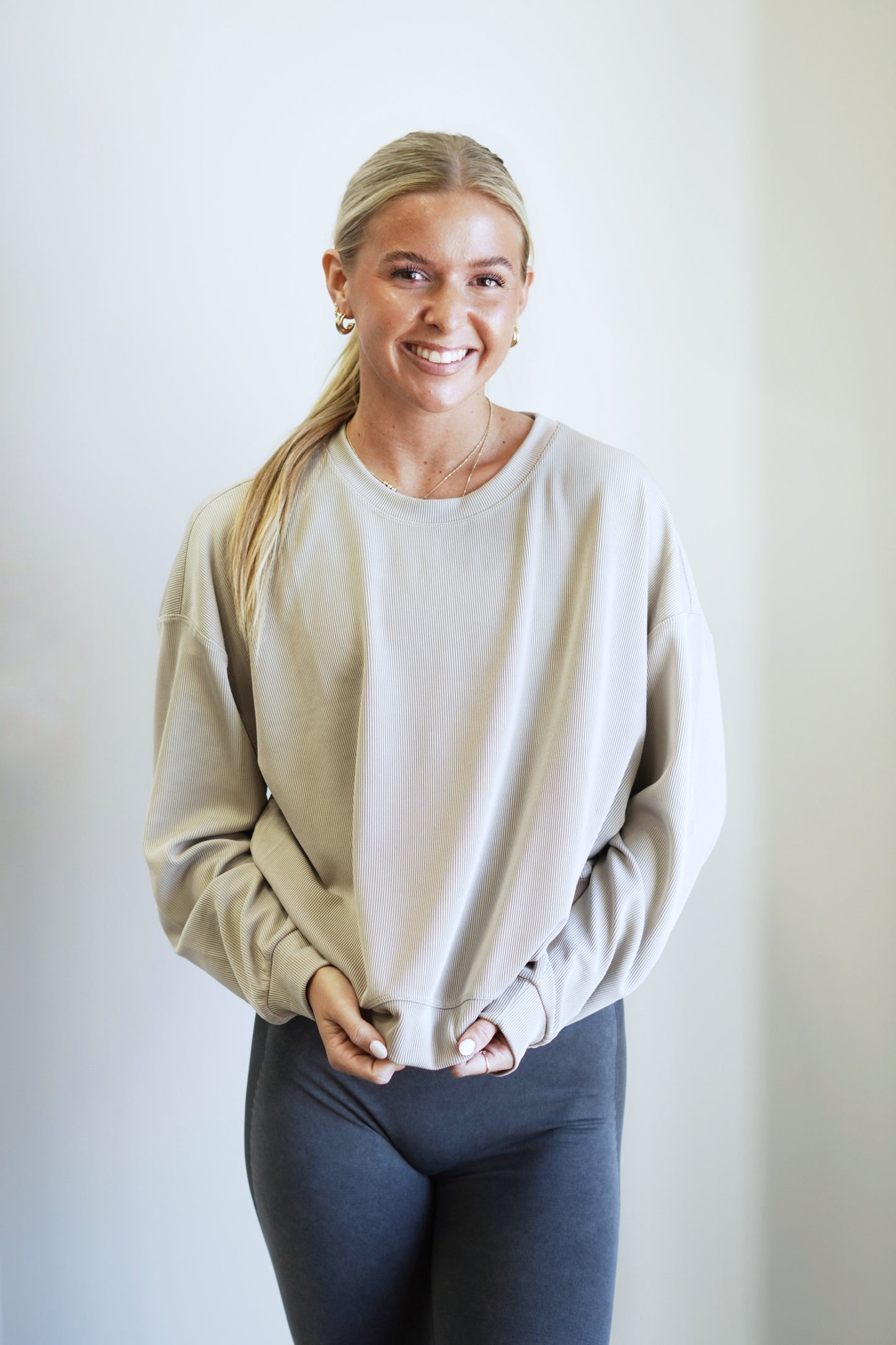 Rori Ribbed Crew Neck Pullover Crew Neckline Long Cuffed Sleeves Cuffed Hem Relaxed Fit Full Length Colors: Shell 96% Polyester, 4% Spandex