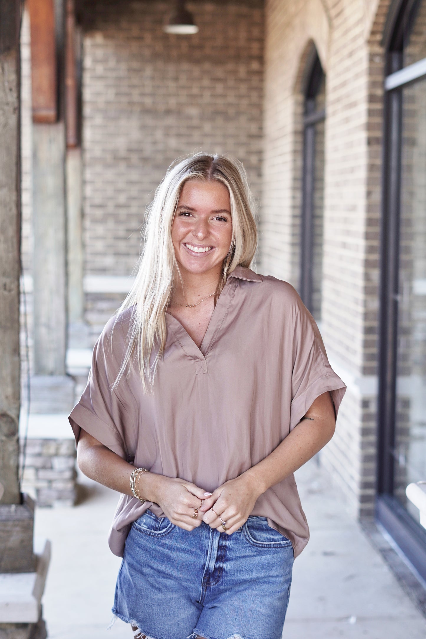 Lola Light Weight Collared Blouse Collared V-Neckline Short Sleeves Light Weight Material Color: Coco Relaxed Fit Full Length 100% Polyester