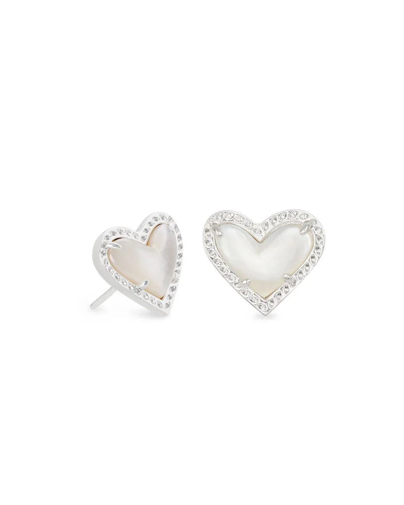 rhodium heart stud earrings with an ivory mother of pearl stone center