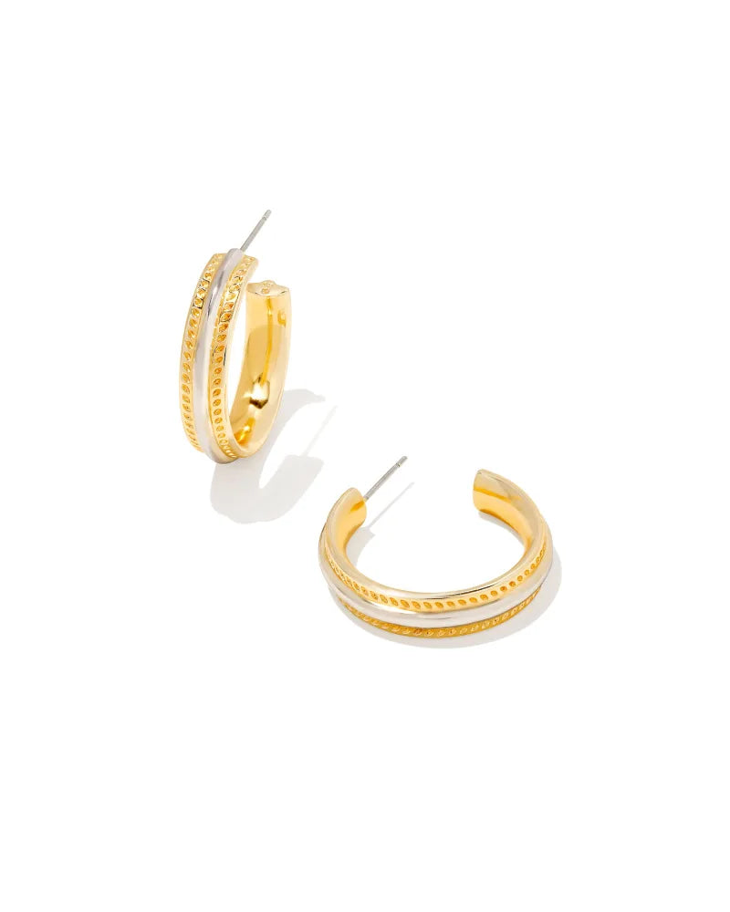Featuring our signature hoofprint detail and a bold, dimensional silhouette, the Merritt Hoop Earrings in Mixed Metal were made for every day and everyone. Pair them with the Merritt Bangle Bracelet for a matching metallic look. Dimensions- 1.02" Outside Diameter Metal- 14k Gold & Rhodium Over Brass Closure- Ear Post