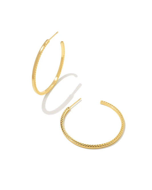 Maximalists will love the Sylvie Hoop Earrings in Gold. From the glossy finish to the statement scale, these bold hoops are designed to have all eyes on you. Dimensions 1.6' OUTER DIAMETER Season FASHION REORDER
