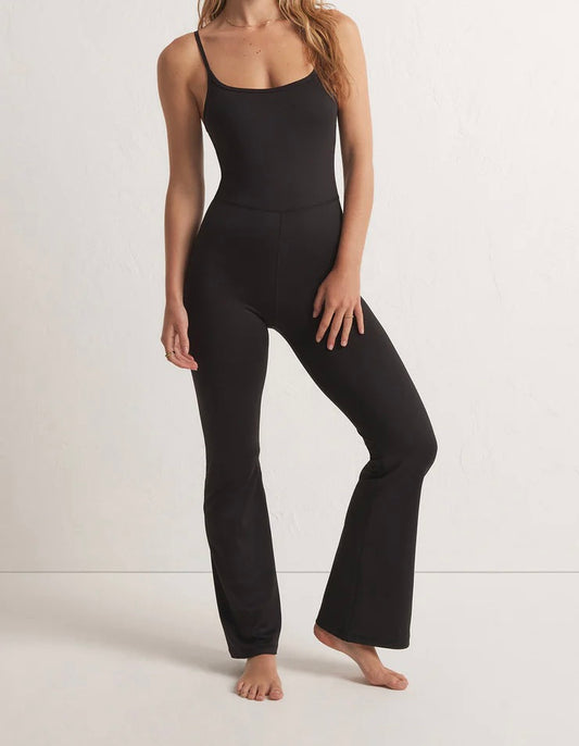 Get Moving Flare Onesie Scoop Neckline Sleeveless Adjustable Straps Color: Black Criss Cross Straps in the Back Flare Leg Opening Full Length Fitted 80% Polyester, 20% Spandex