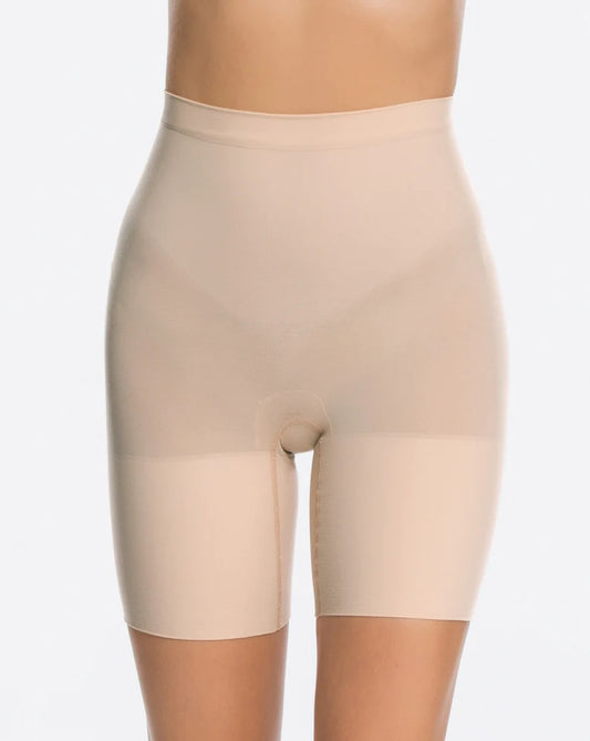Spanx Power Short Shaping zones target the stomach and provide all-over support with gradual release for comfort and movement Cotton blend gusset – wear as underwear and eliminate VPL (Visible Panty Lines) 55% Nylon, 45% Elastane. Care: Machine Wash Cold, Gentle Cycle. Only Non-Chlorine Bleach When Needed. Tumble Dry Low. Do Not Iron. Nude is Pictured here.