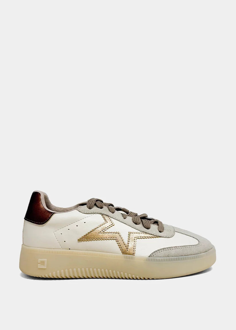 Cream and gold star sneaker with a platform sole, low-top silhouette, and brown laces.