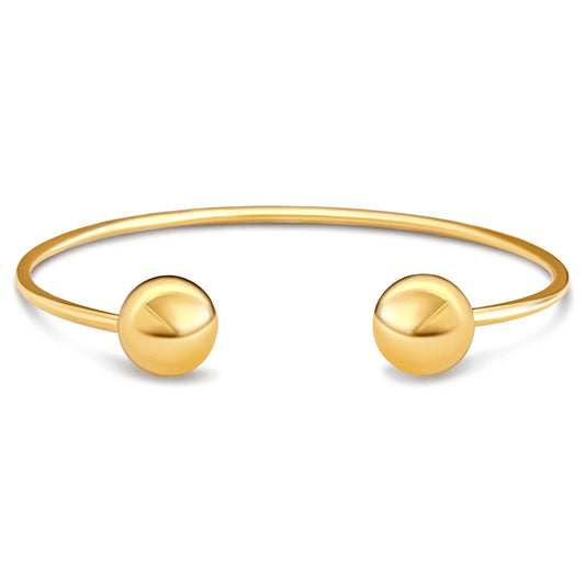 gold cuff bracelet with a gold bead on each end