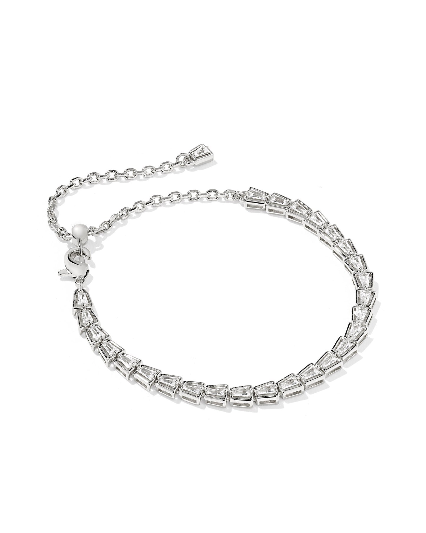 A style staple in every jewelry box, soon to be a go-to in your collection: It’s the Bella Silver Tennis Bracelet. This fresh take on the classic tennis bracelet silhouette is designed with cubic zirconia stones in a tapered baguette shape for sparkle that stuns from every angle. Styling tip: try pairing this bracelet with your favorite watch for a super chic look.
Metal- 14k Yellow Gold Over Brass, Rhodium Over Brass
Closure- Lobster Clasp on Adjustable Slider Bead
Size- 8" CHAIN