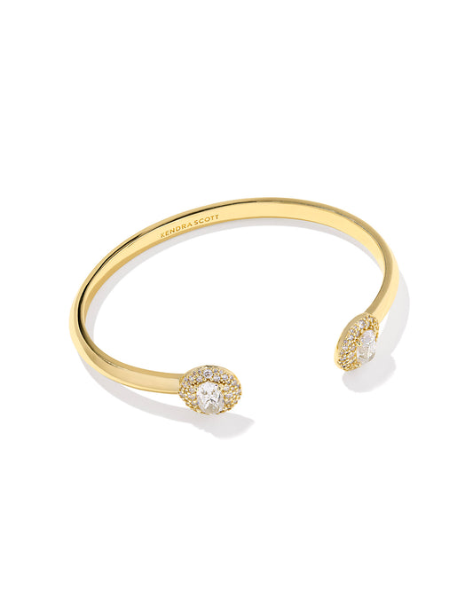 Add some enviable shine to your bracelet stack with the Bella Gold Cuff Bracelet. This sleek cuff style features a high-shine metal finish and gorgeous endpieces anchored with a custom-cut crystal in our bestselling Elisa shape, surrounded by dazzling cubic zirconia sparkle.
Metal- 14K Yellow Gold Over Brass
Closure- Non-Adjustable
Size- 2.28 INNER DIAMETER