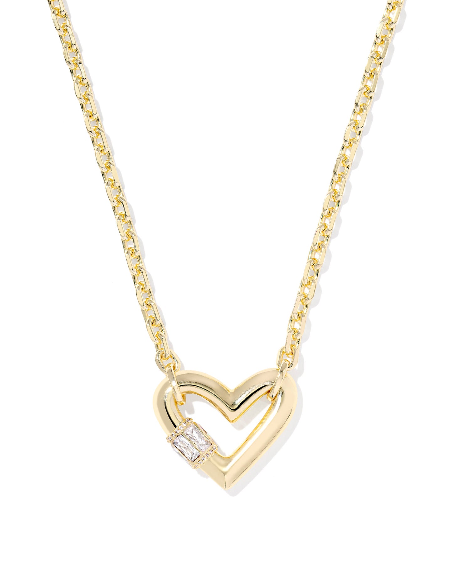 Show some love to your necklace stack with the Emery Heart Gold Short Pendant Necklace. Featuring a bold heart-shaped pendant—inspired by our bestselling Ari silhouette—studded with gorgeous baguette stones for extra sparkle, this necklace is a heartfelt take on the hardware jewelry trend.
Metal- 14k Yellow Gold Over Brass Closure- Lobster Clasp
Size- 16" CHAIN WITH 3" EXTENDER, 0.85"L X 1.03"W PENDANT
