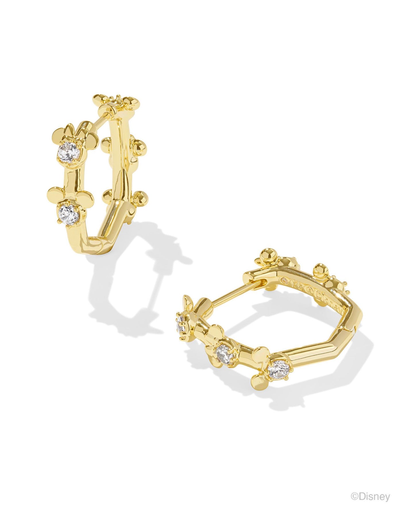 Crystal studded alternating "Mickey" and "Minnie" small head pendants. Gold huggie earrings