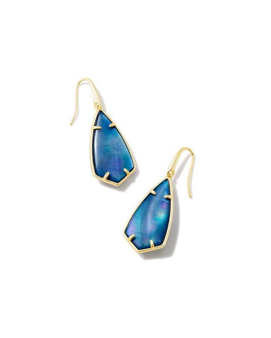 With their elongated, face-framing silhouette, the Camry Gold Drop Earrings look good on everyone. Featuring our archival Camry stone shape with a sleek new metal frame, these earrings add the finishing touch to any outfit. This metal is 24k gold plated over brass with deep blue mother of pearl stones.
