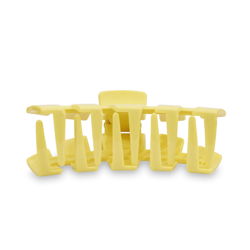 Say goodbye to breakable clips! We have perfected the hair tie and now have re-invented the clip. Each clip has bendable teeth that take back to shape, they work on all hair types and have a strong hold. Hold your hair and enhance your style with the new TELETIES Clip! Medium clips are great for thick to medium thickness of hair. The medium clip is 3.73 inches long. yellow color