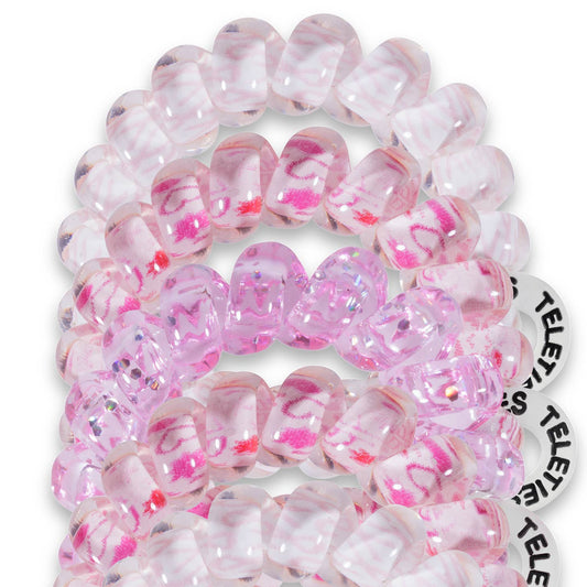 Small yet mighty, the tinyTELE boasts the same no-rip, strong-grip hair tie features you love and the fashionable styling you expect from TELETIES, now in smaller, tinier size. Perfect for little kids' hair, top knots, and the end of braids. Sold in packs of five. Breast cancer symbol pink color