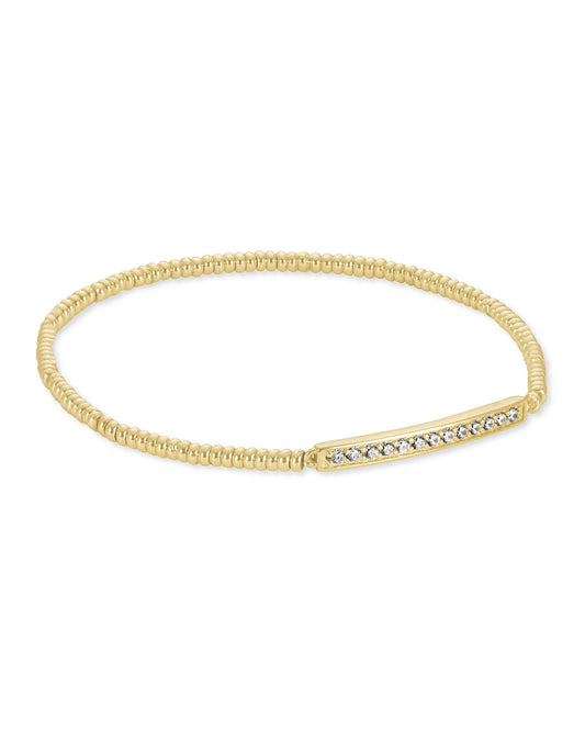 Gold beaded stretch bracelet with 3cm bar with crystals. 14k Gold Plated Over Brass. 6.5" unstretched circumference with 1"L x 0.11"W stations