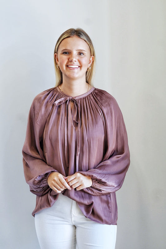 Brooke Balloon Sleeve Satin Blouse V-Neckline w/ Connecting Tie Long Balloon Sleeves Satin Brownish Purple Color Full Length Relaxed Fit 100% Polyester