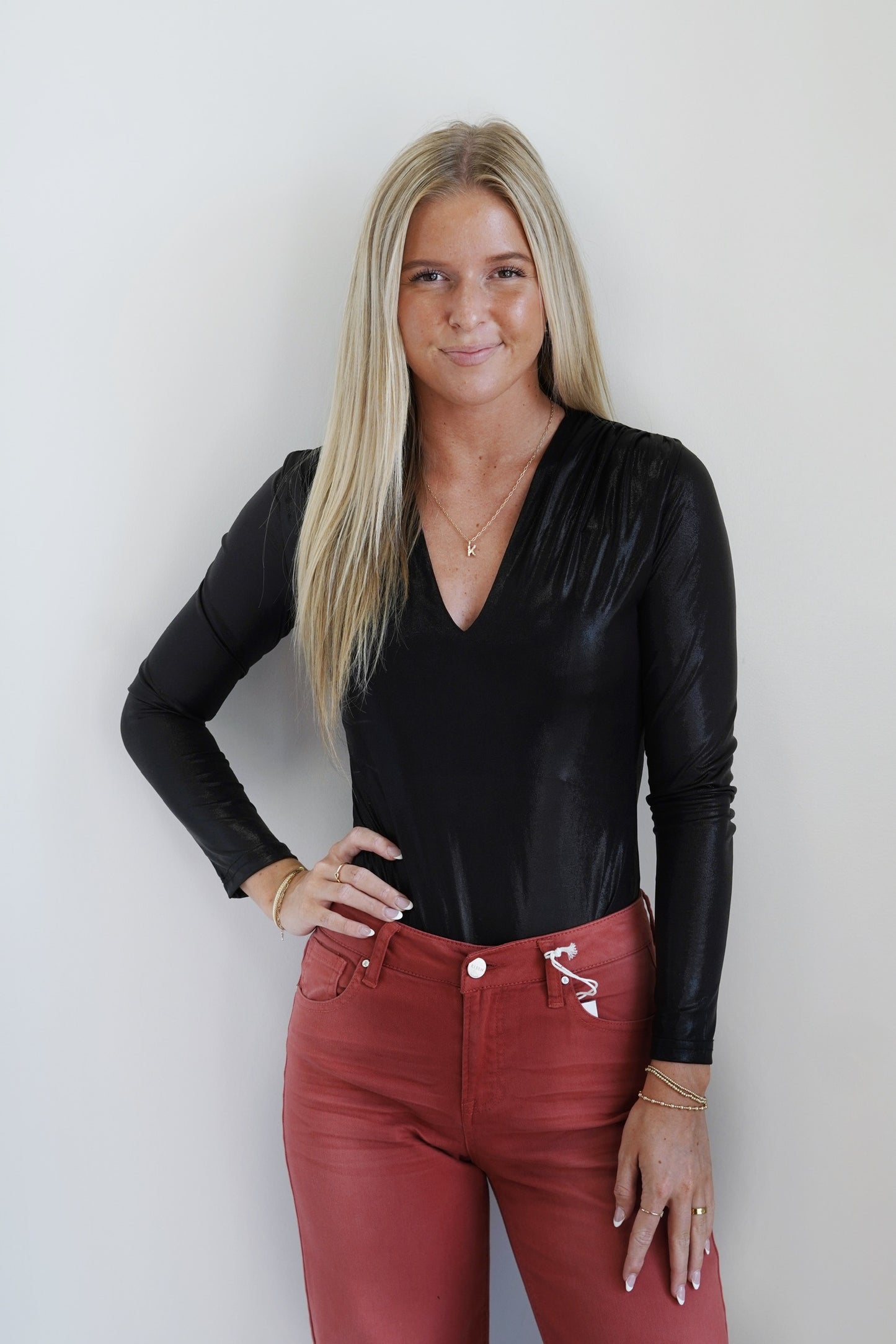 Stella Shiny Black Bodysuit V-Neckline Long Sleeves Bodysuit Shiny Black Color Fitted 95% Polyester, 5% Spandex