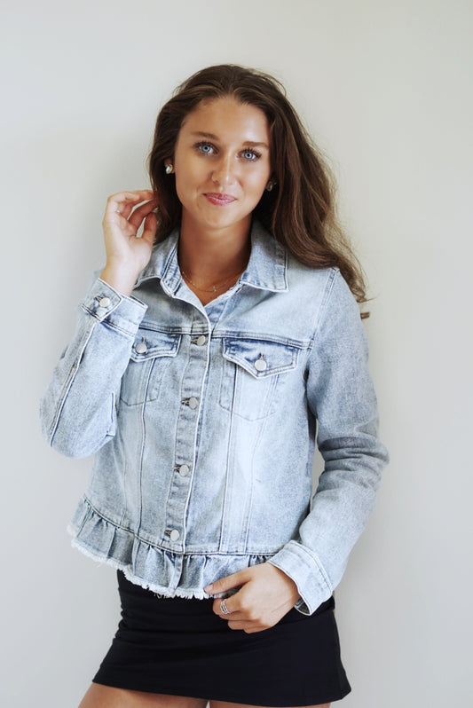 Raleigh Ruffled Raw Hem Denim Jacket Collared Neckline Long Sleeve Ruffled Hem Colors: Light Denim, Dark Denim Skimmer Length 70% Cotton, 26% Polyester, 3% Rayon, 1% Spandex Care:Machine Wash Cold, Tumble Dry Slow Model is wearing a size small