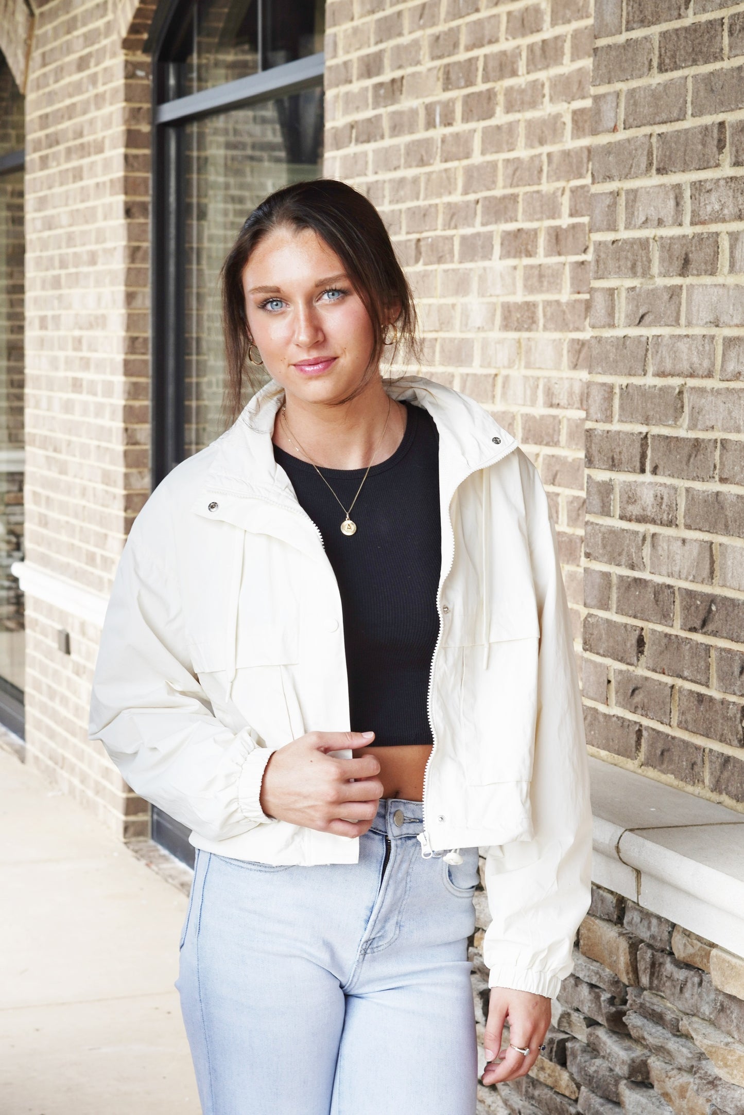 Tiebreak Nylon Jacket Zip Up/ Button Closure Front Pockets Long Cinched Sleeves Hood w/ Drawstrings Bungee Drawstrings to Adjust the Hem Color: Sandstone 100% Nylon