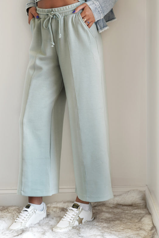 Daisy Drawstring Wide Leg Pants Elastic Waistband Drawstring Wide leg Color: Sage Green Side Pockets 55% Rayon, 40% Polyester, 5% Spandex
