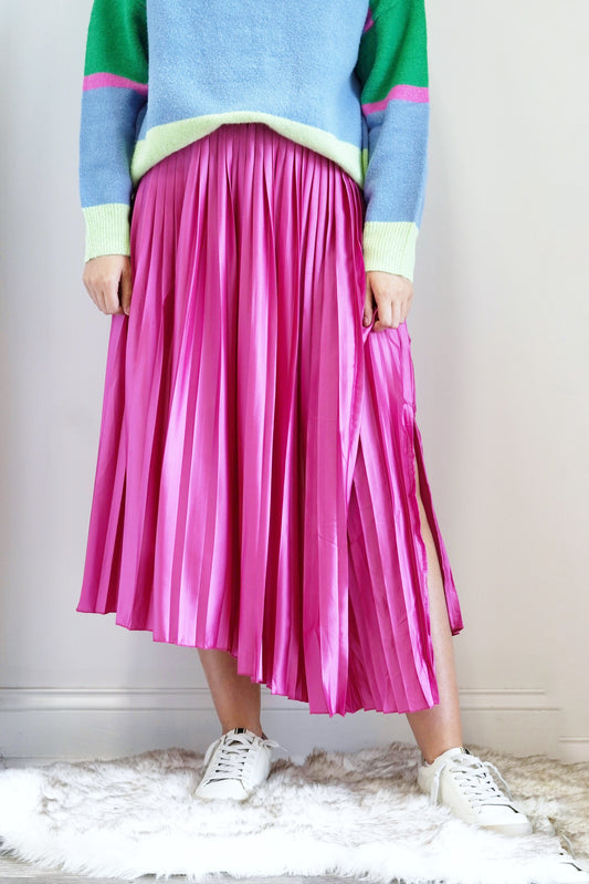 Polly Pleated Asymmetrical Hem Satin Midi Skirt Elastic Waistband Asymmetrical Hem Side/Front Slit Midi Length Flowy Pleated Material Colors: Pink, 97% Polyester, 3% Elastane