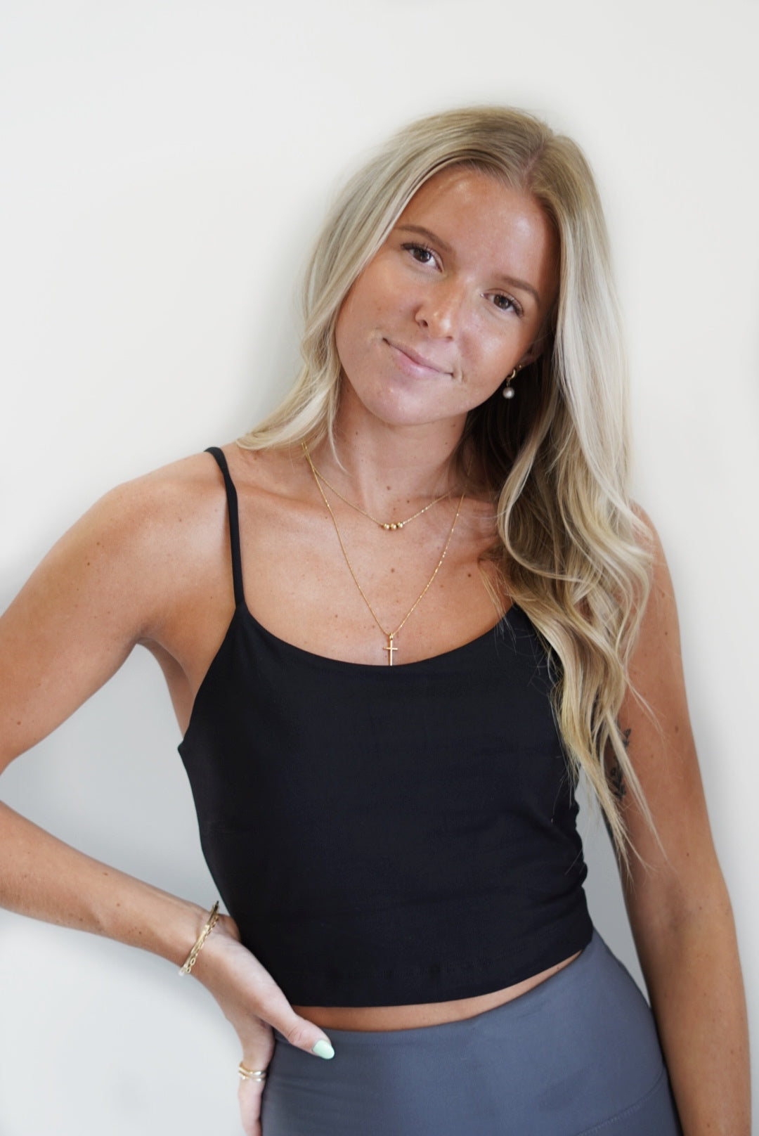 Whether you are going to the gym to workout with your friends or just need a cute top to wear with leggings or jeans, this Caitlyn Cropped Athletic Cami Top will be perfect for you. Both cute and comfy, this Cropped Athletic Top can be worn so many different ways! Caitlyn Cropped Athletic Cami Top Adjustable Spaghetti Straps Built in bra pads Cropped Length Color/Black Tighter Fit 84% Poly Micro Fiber, 16% Spandex Hand Wash Cold with like colors Model is wearing a size small