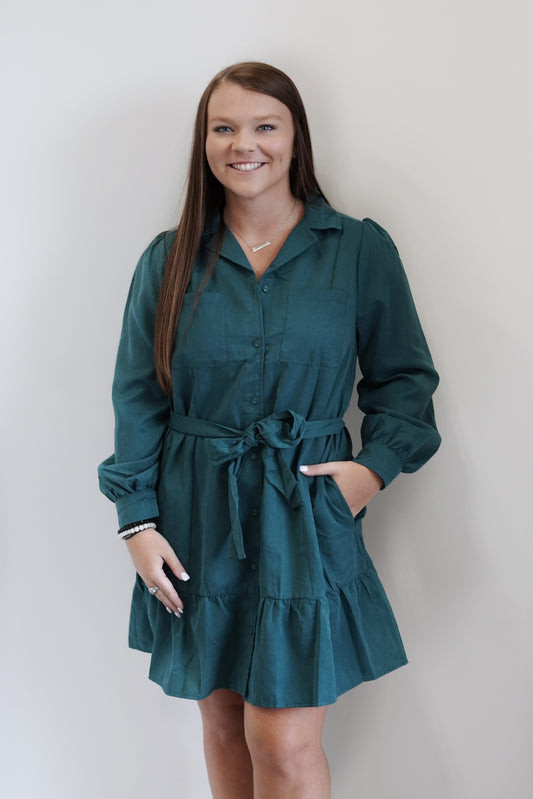 Cale Collared Waist Tie Dress Collared Neckline Long Cuffed Sleeves Front Chest Pockets Hunter Green Relaxed Fit 97% Polyester, 3% Nylon Care: Hand wash cold, Only use non chlorine bleach, Line dry, Low iron as needed