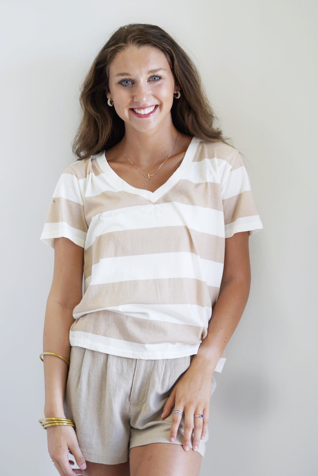 Lily Girlfriend V-Neck Tee V-Neckline Relaxed Fit Short Sleeves Colors: Black, Birch, Striped White and Birch Machine wash cold, turn inside out, gentle cycle, wash with like colors, do not bleach, tumble dry low, warm iron if needed, do not dry clean Whisper Cotton Jersey: 100% Cotton Model is wearing a size small