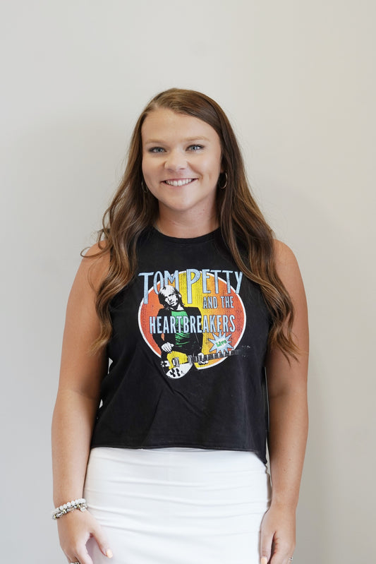 "Tom Petty and t5he Heartbreakers" Graphic Tank Crew Neckline Sleeveless Tom Petty Portrait Graphic Design "Tom Petty and the Heartbreakers" Lettering Raw Hem Black Color Skimmer Length Relaxed Fit 100% Cotton